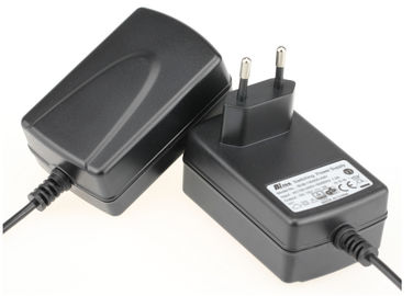 Un bon prix. 600ma Noir 12V AC DC Adaptateur universel monté sur le mur pour la charge du téléphone en ligne